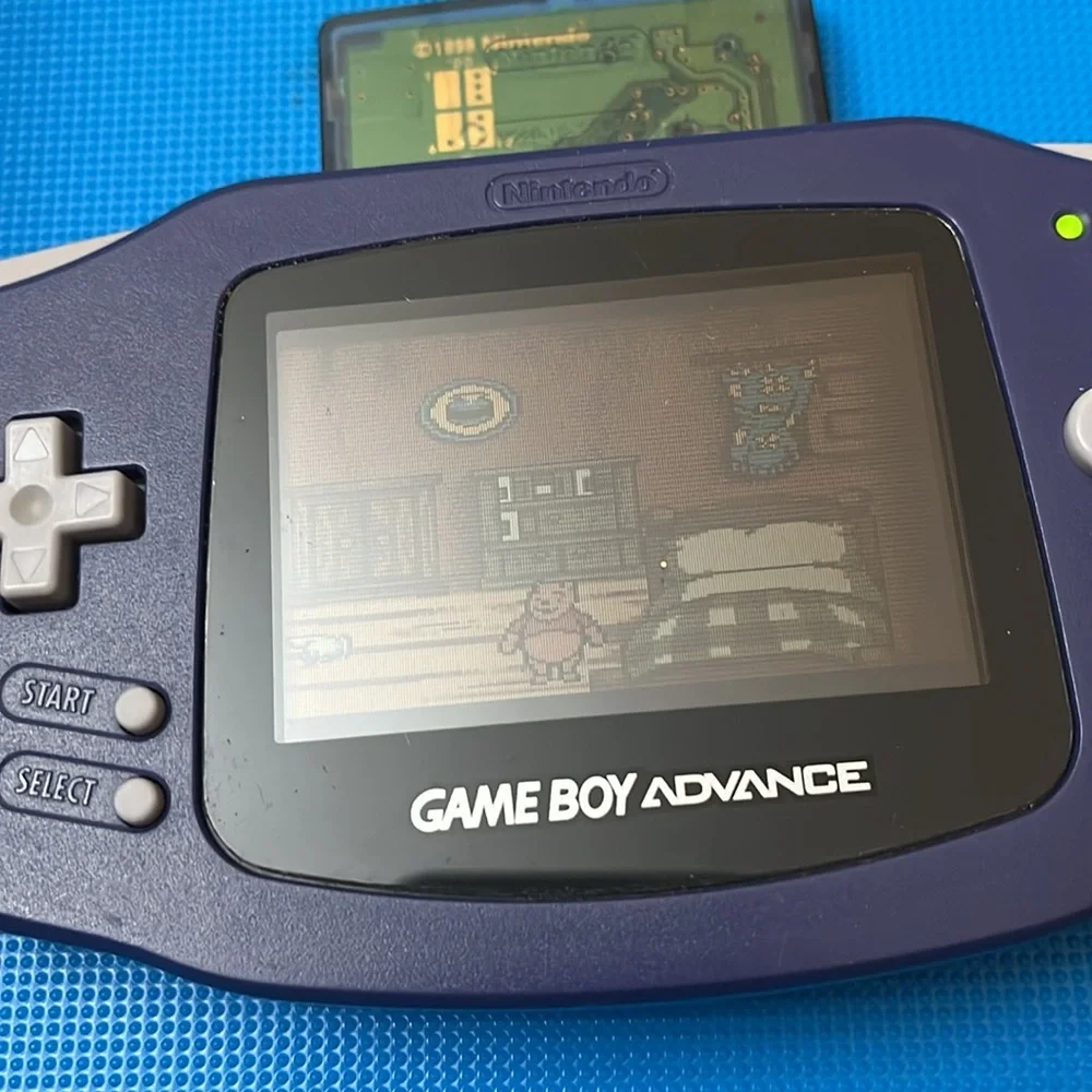 GAME BOY ADVANCE. PURPLE. BATTERY COVER MISSING. POOH GAME included
